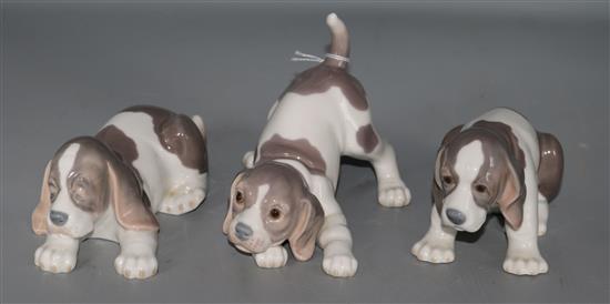 A group of three Lladro puppies